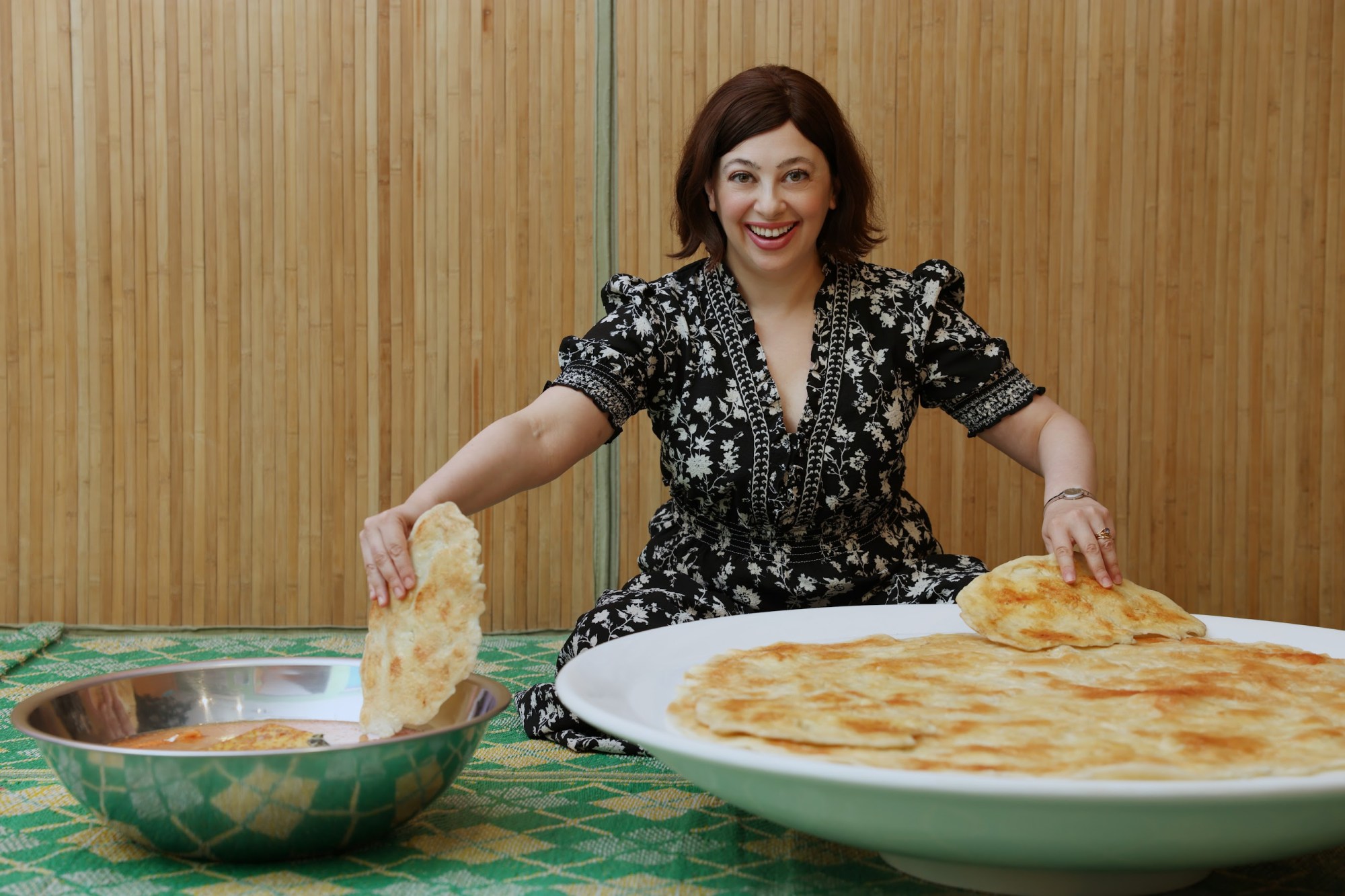Tearing up some roti canai